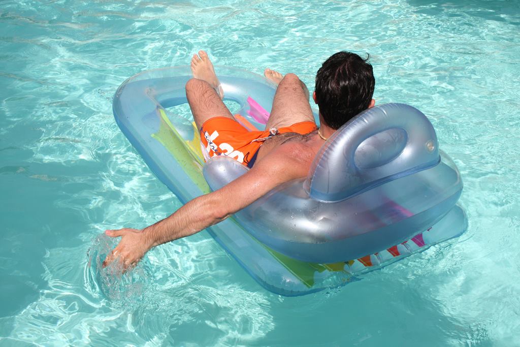 Man relaxing in pool
